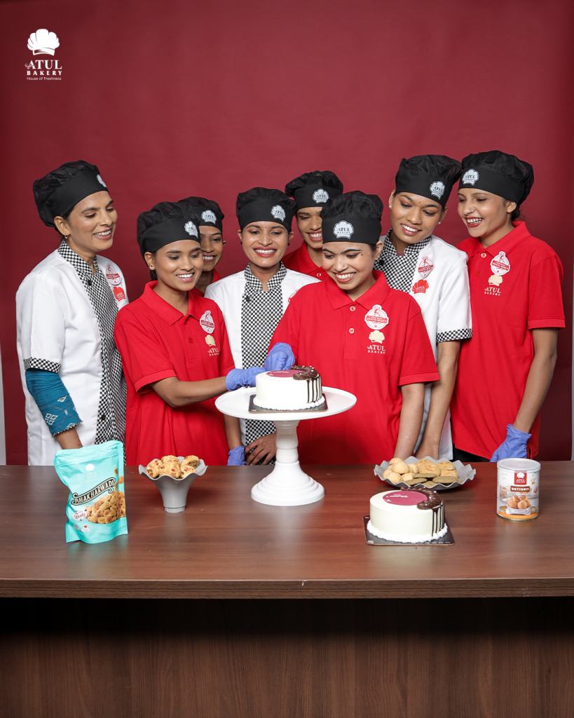 Training Session at Atul Bakery – A group of bakery staff being trained by a head chef, demonstrating the skill-building behind consistent quality