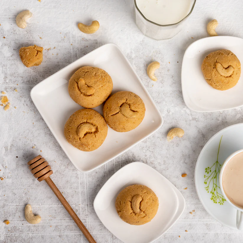 Cookies and Milk Setup – A cozy table setup with Atul Bakery’s cookies and a glass of fresh milk, perfect for all ages.